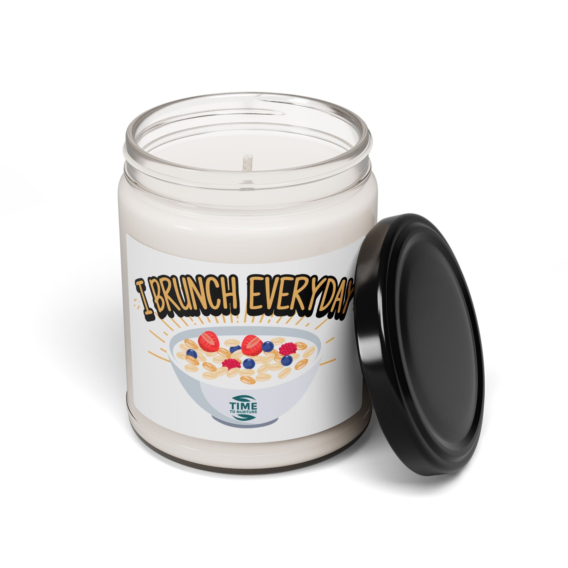 "I Brunch Everyday" scented soy candle in a 9oz amber glass jar, featuring natural soy wax, a cotton wick, and a long burn time, emitting delightful aromatic scents.