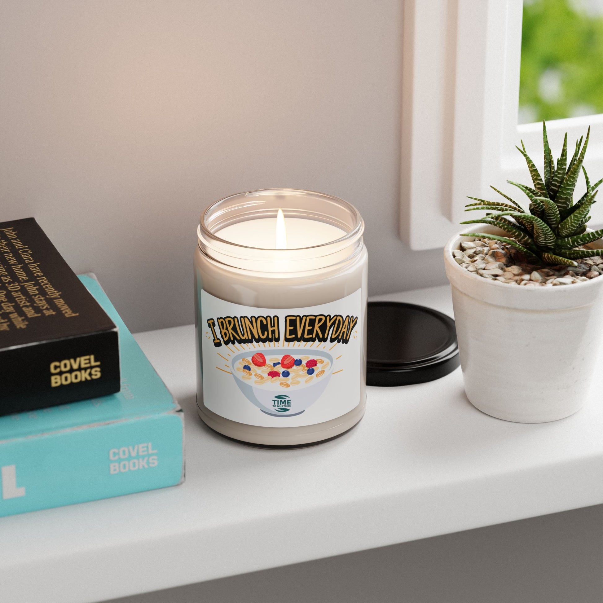 "I Brunch Everyday" scented soy candle in a 9oz amber glass jar, featuring natural soy wax, a cotton wick, and a long burn time, emitting delightful aromatic scents.