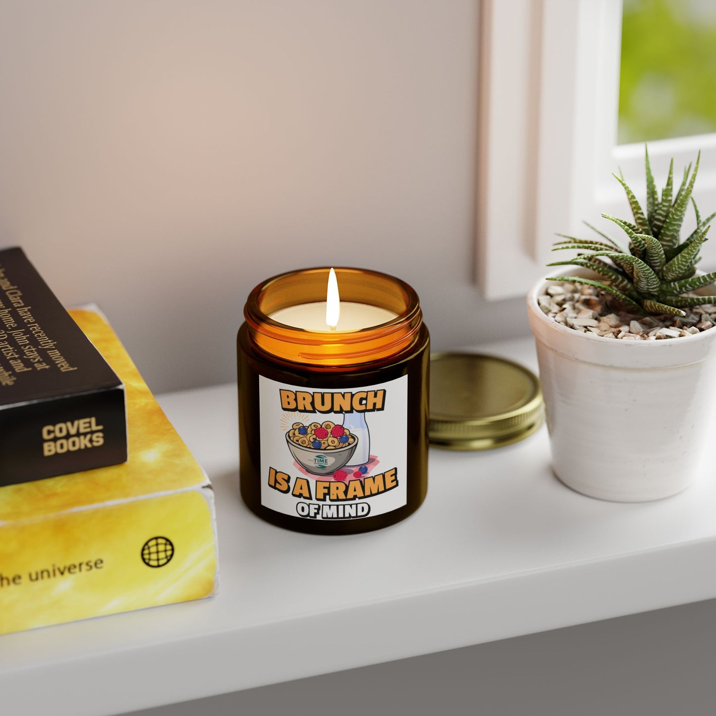 A coconut apricot wax candle labeled "Brunch is a Frame of Mind," styled for home fragrance and aromatherapy, with a minimalistic design perfect for brunch-themed gifts, housewarming decor, or relaxation.