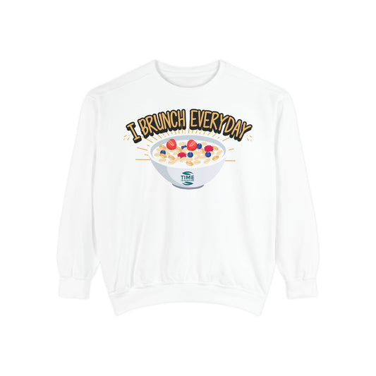 A unisex sweatshirt with the phrase I Brunch Everyday printed on the front. A humorous and stylish option for brunch lovers, perfect as a retirement party gift or a present for him or her.