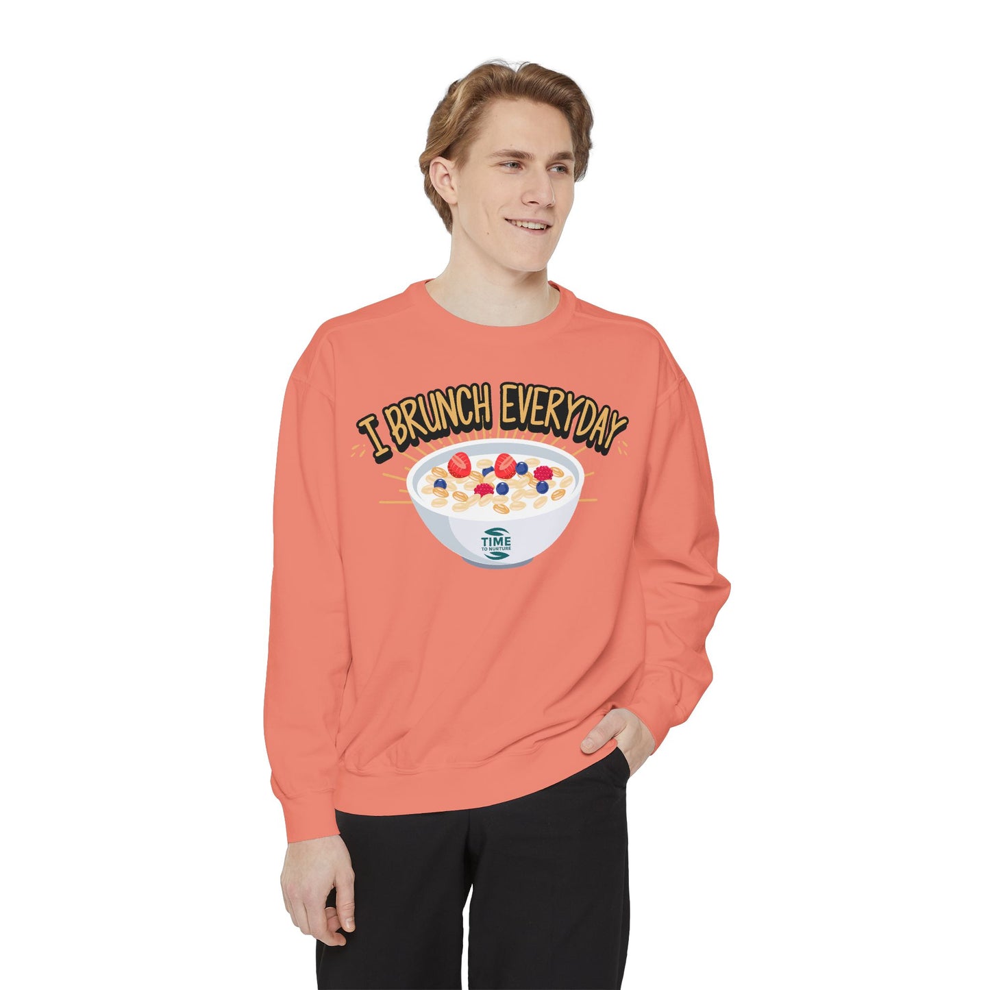 A unisex sweatshirt with the phrase I Brunch Everyday printed on the front. A humorous and stylish option for brunch lovers, perfect as a retirement party gift or a present for him or her.