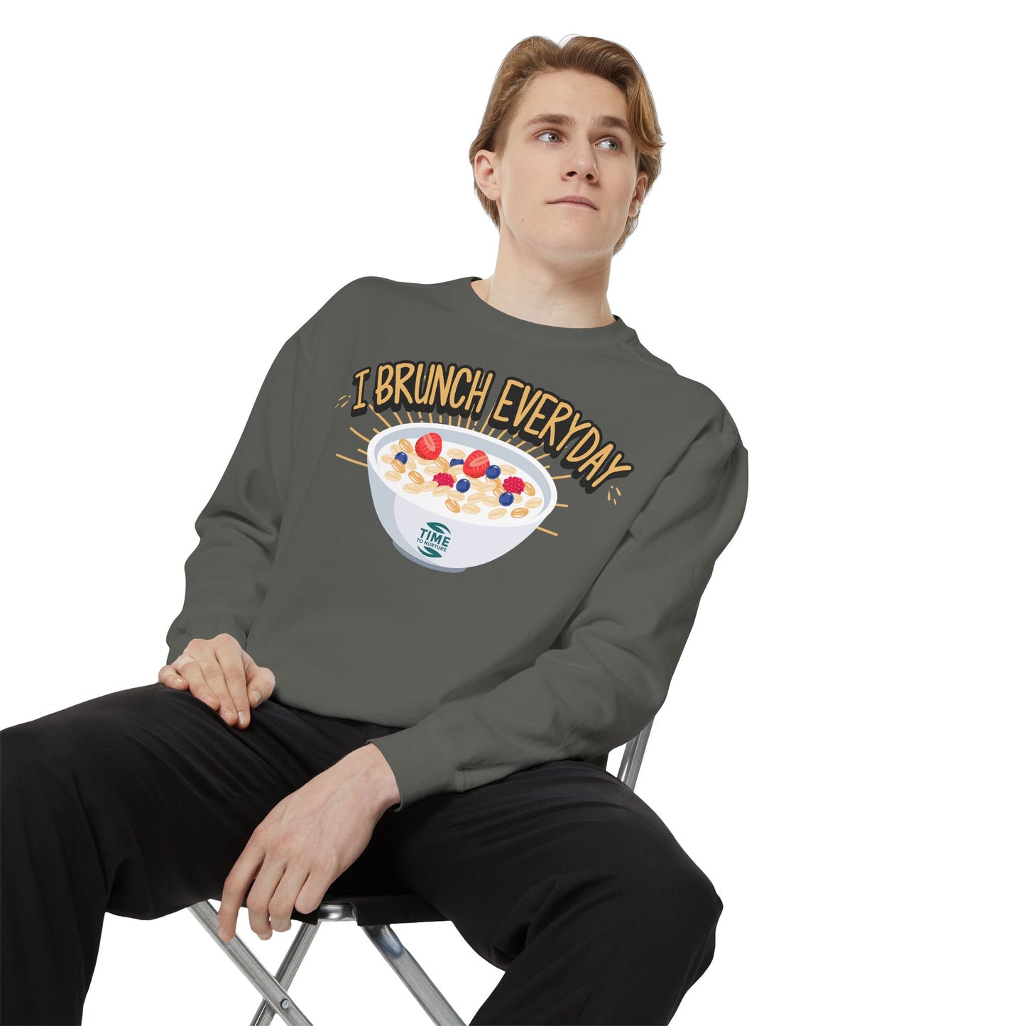 A unisex sweatshirt with the phrase I Brunch Everyday printed on the front. A humorous and stylish option for brunch lovers, perfect as a retirement party gift or a present for him or her.