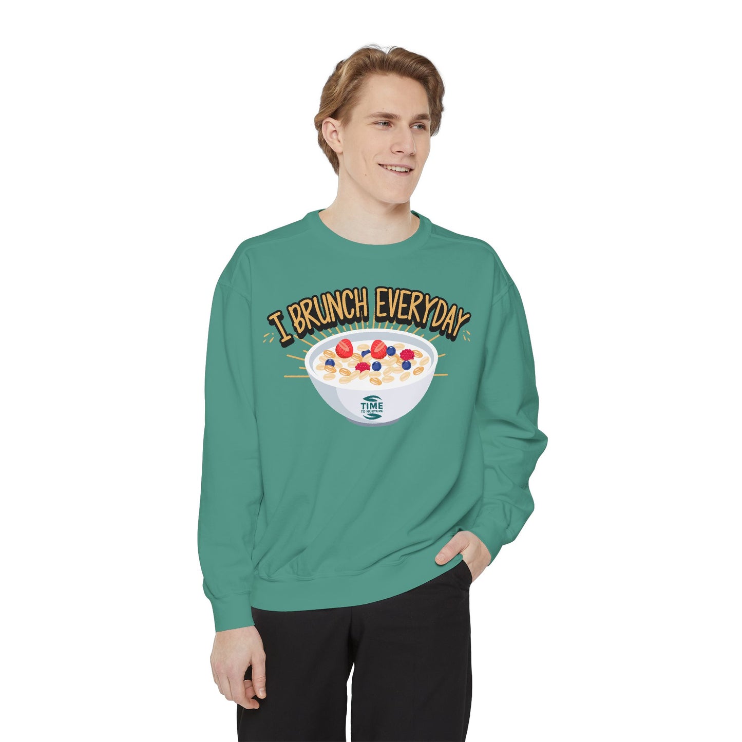 A unisex sweatshirt with the phrase I Brunch Everyday printed on the front. A humorous and stylish option for brunch lovers, perfect as a retirement party gift or a present for him or her.