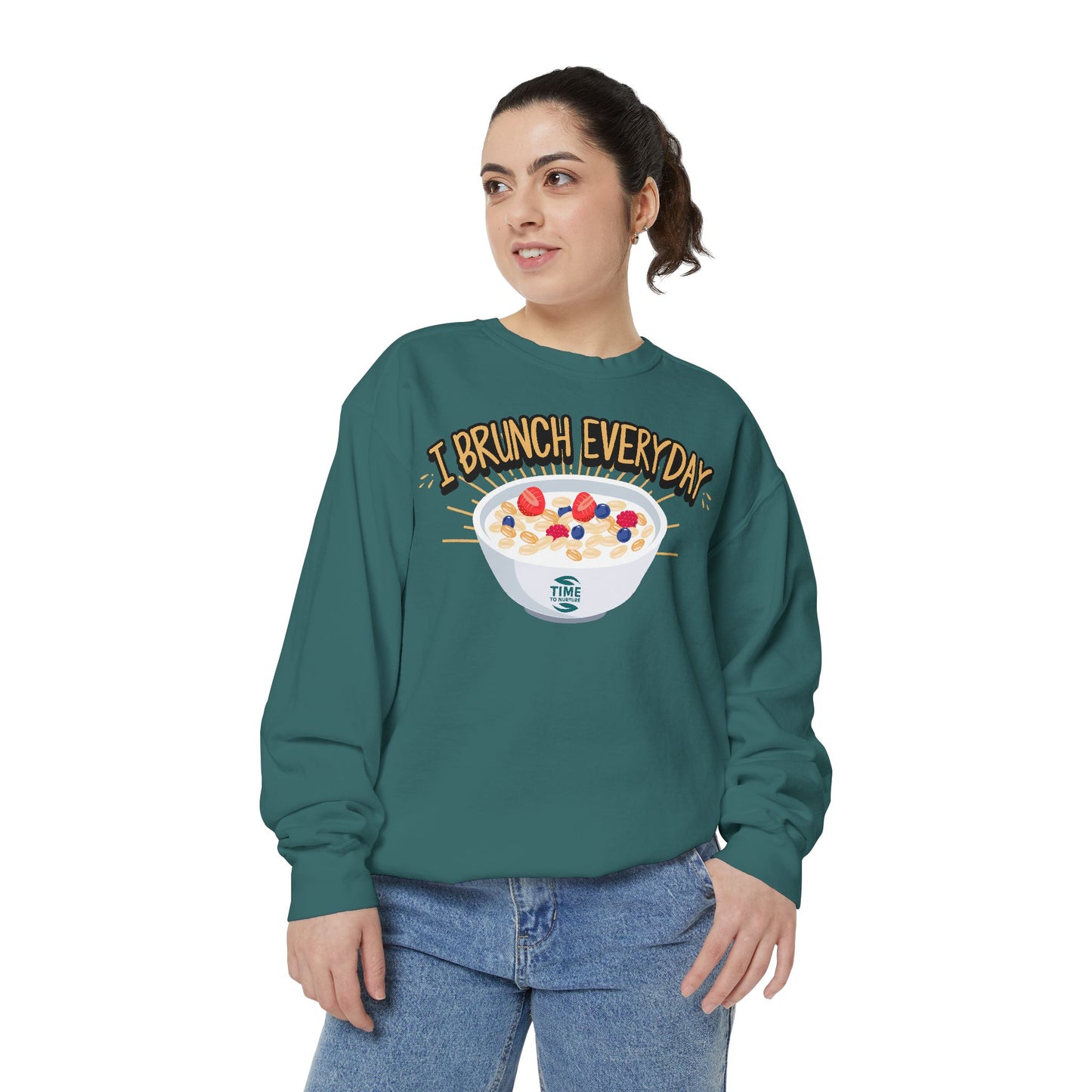 A unisex sweatshirt with the phrase I Brunch Everyday printed on the front. A humorous and stylish option for brunch lovers, perfect as a retirement party gift or a present for him or her.