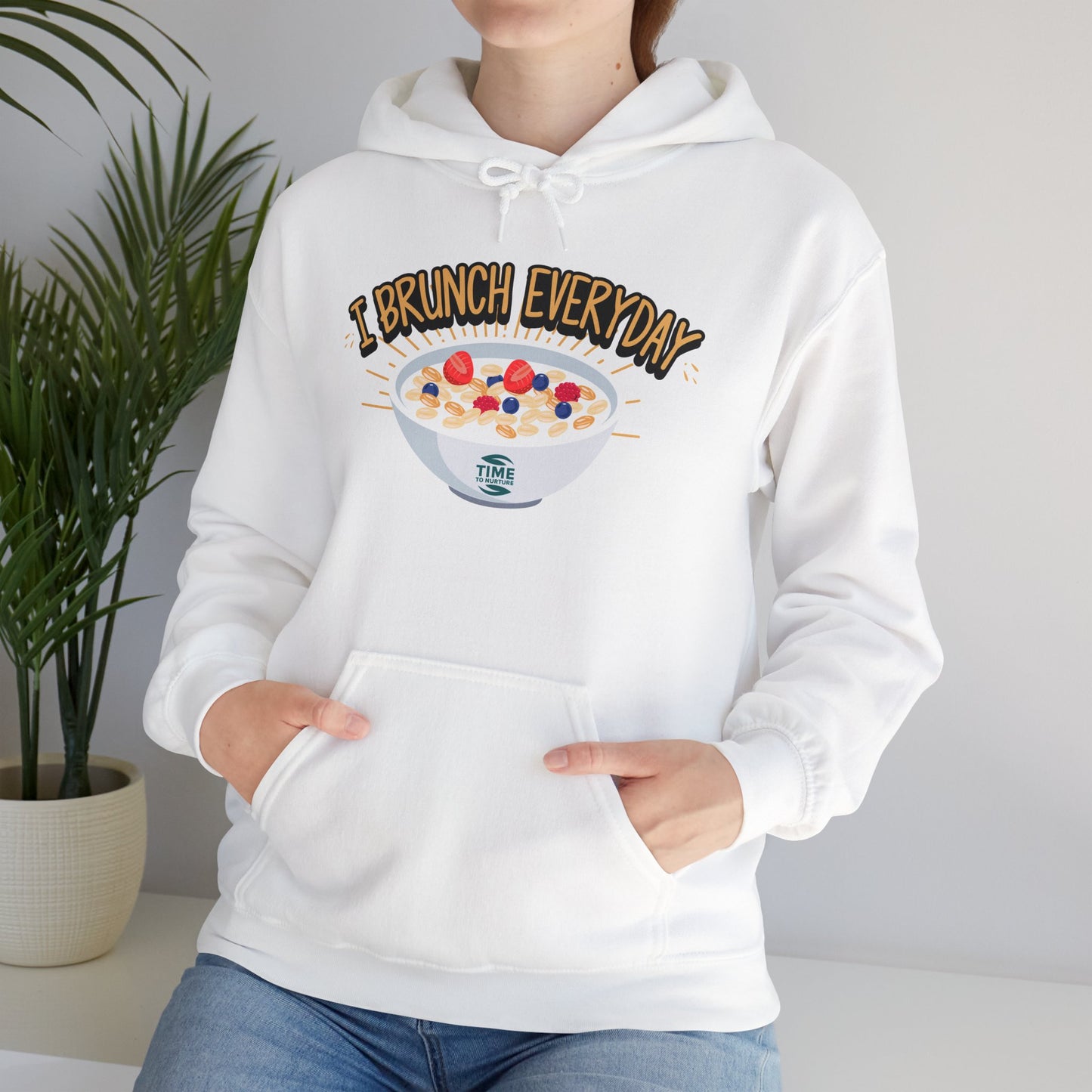 Alt text: A unisex hooded sweatshirt with the phrase "I Brunch Everyday" printed on the front. Ideal for brunch lovers, the hoodie is designed as a retirement gift or casual wear.