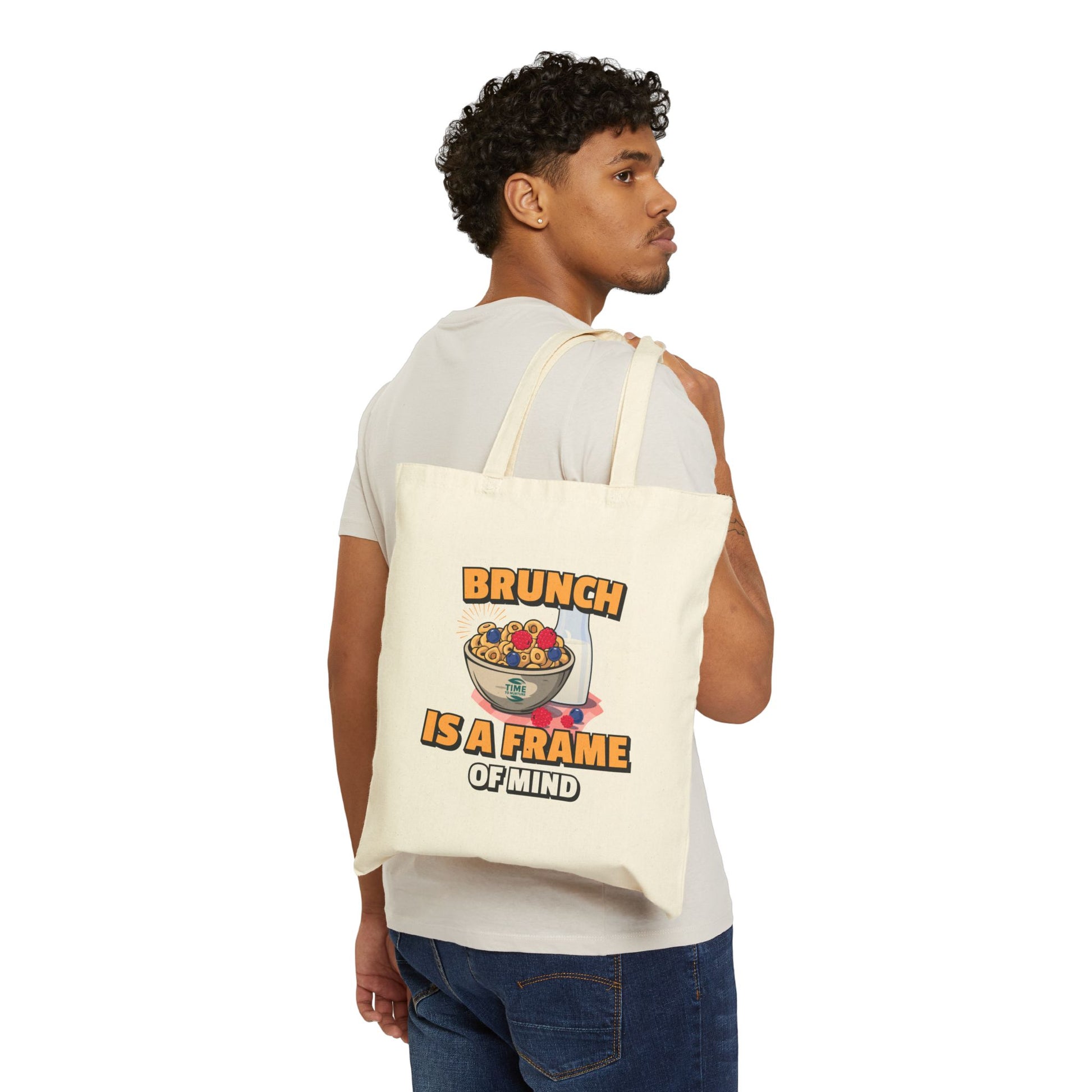 Cotton canvas tote bag with the phrase "Brunch Is a State of Mind," designed for carrying essentials in style. Ideal for brunch lovers, weekend adventures, and everyday use, blending practicality with a fun, casual vibe