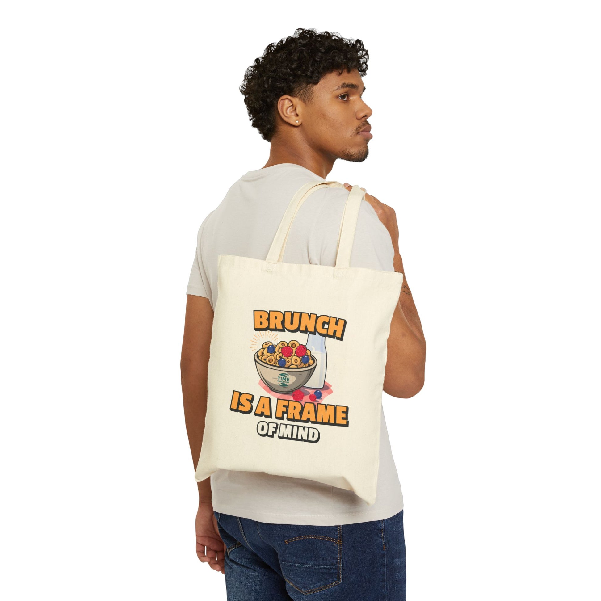 Cotton canvas tote bag with the phrase "Brunch Is a State of Mind," designed for carrying essentials in style. Ideal for brunch lovers, weekend adventures, and everyday use, blending practicality with a fun, casual vibe
