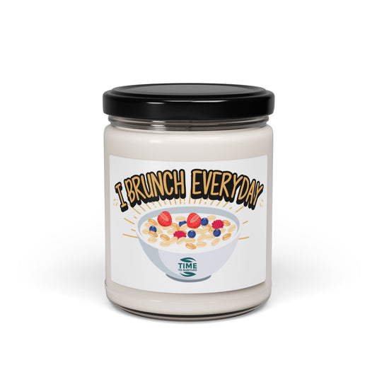 "I Brunch Everyday" scented soy candle in a 9oz amber glass jar, featuring natural soy wax, a cotton wick, and a long burn time, emitting delightful aromatic scents.