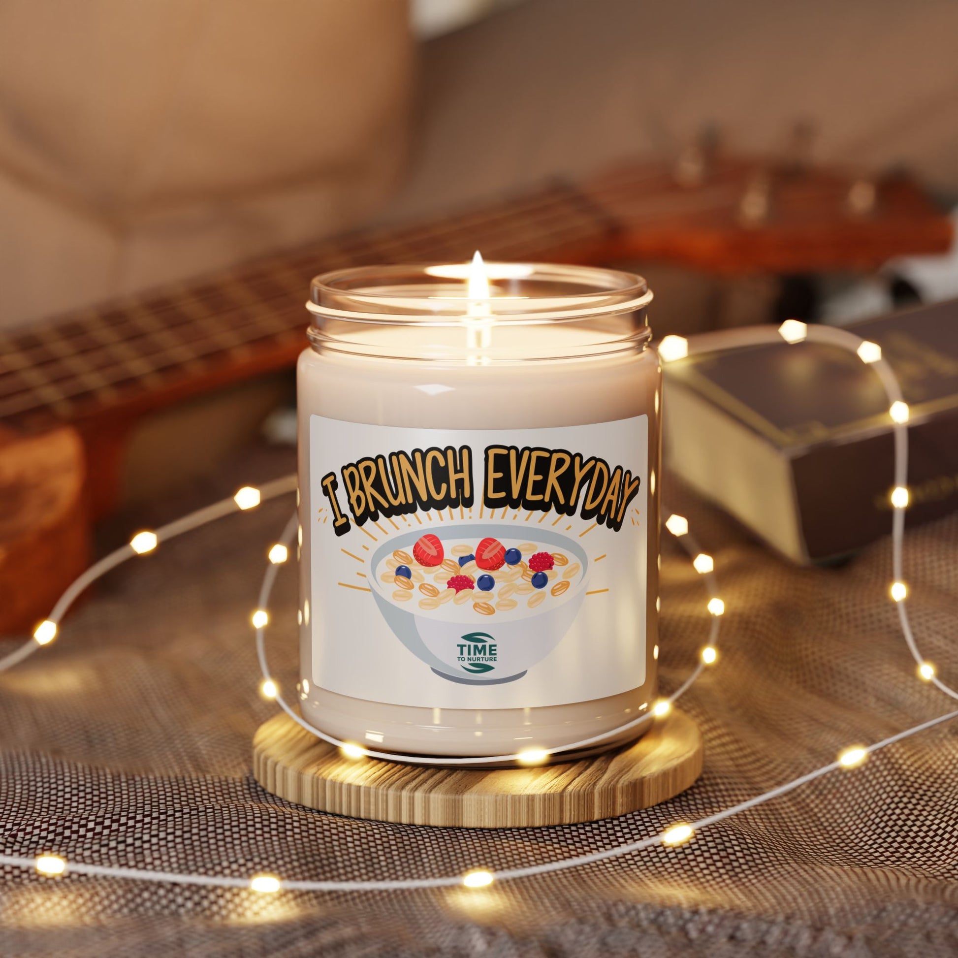 "I Brunch Everyday" scented soy candle in a 9oz amber glass jar, featuring natural soy wax, a cotton wick, and a long burn time, emitting delightful aromatic scents.