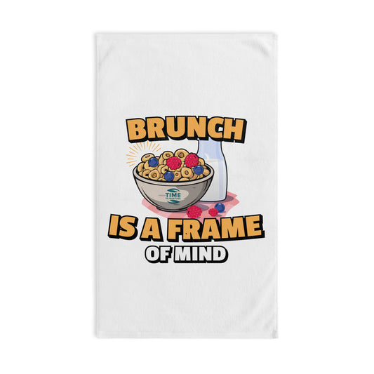 Playful kitchen hand towel featuring "Brunch is a Frame of Mind" text, perfect for foodies, brunch lovers, and humor enthusiasts. A fun and quirky addition to kitchen or bathroom decor, adding personality and charm.