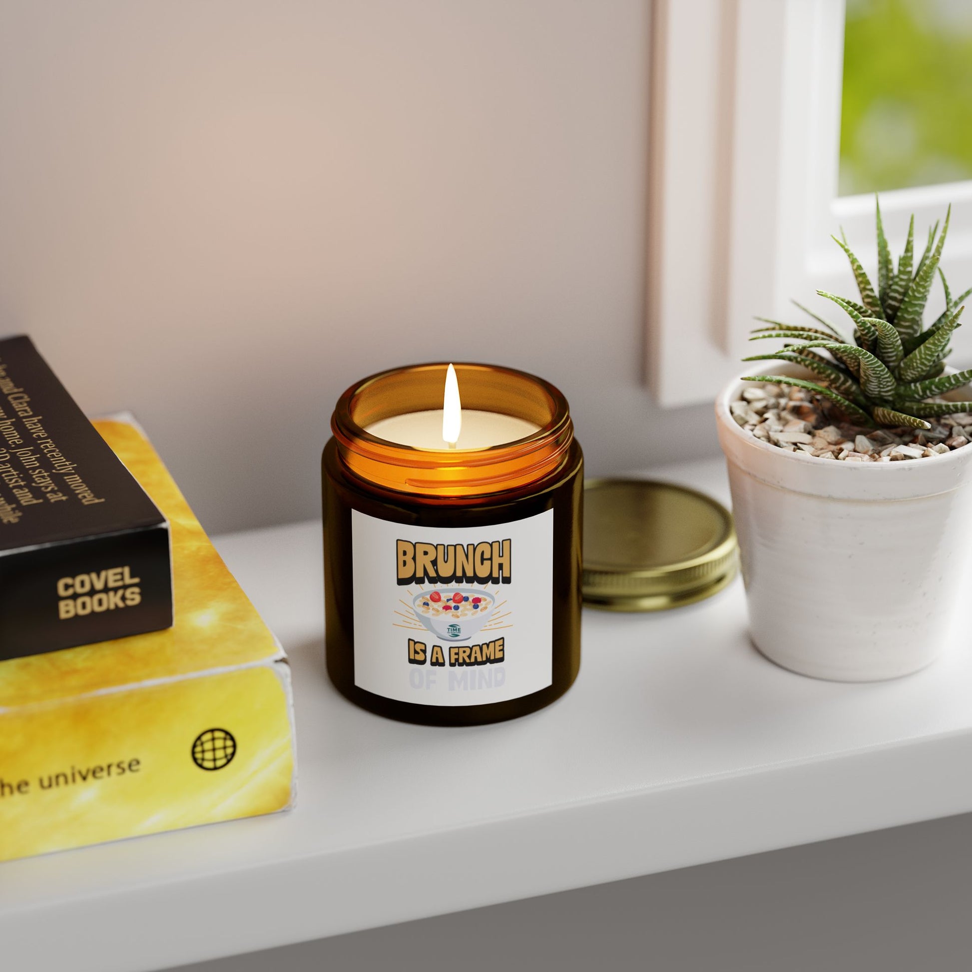 Scented candles made with coconut apricot wax, featuring the phrase brunch is a frame of mind. Available in 4oz and 9oz sizes, perfect as a retirement gift or for brunch enthusiasts.