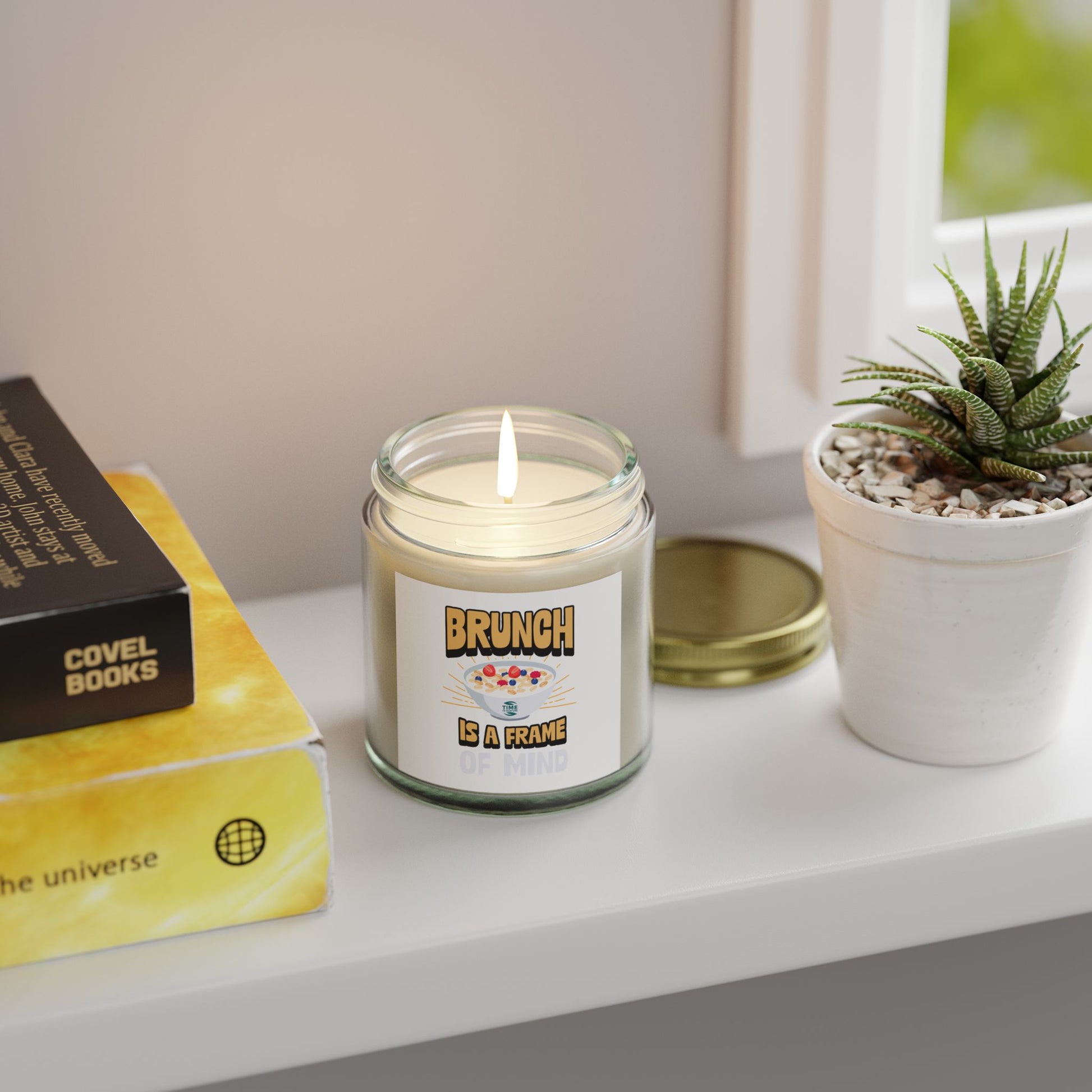 Scented candles made with coconut apricot wax, featuring the phrase brunch is a frame of mind. Available in 4oz and 9oz sizes, perfect as a retirement gift or for brunch enthusiasts.