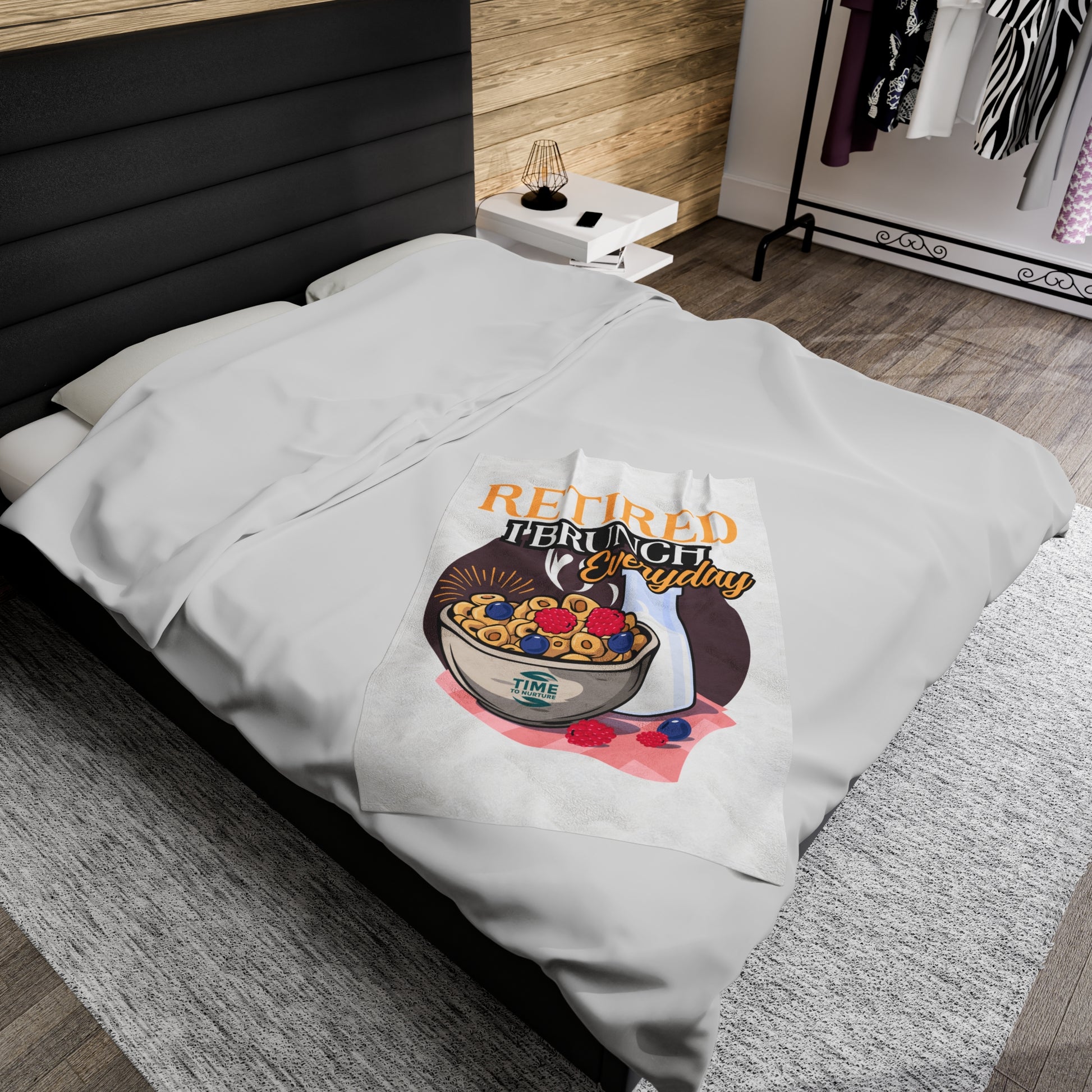 Soft velveteen plush blanket with the phrase "Retired I Brunch Everyday" printed on it. Cozy and stylish, perfect for relaxing at home, adding warmth to any space, or gifting to retirees who love brunch and comfort.