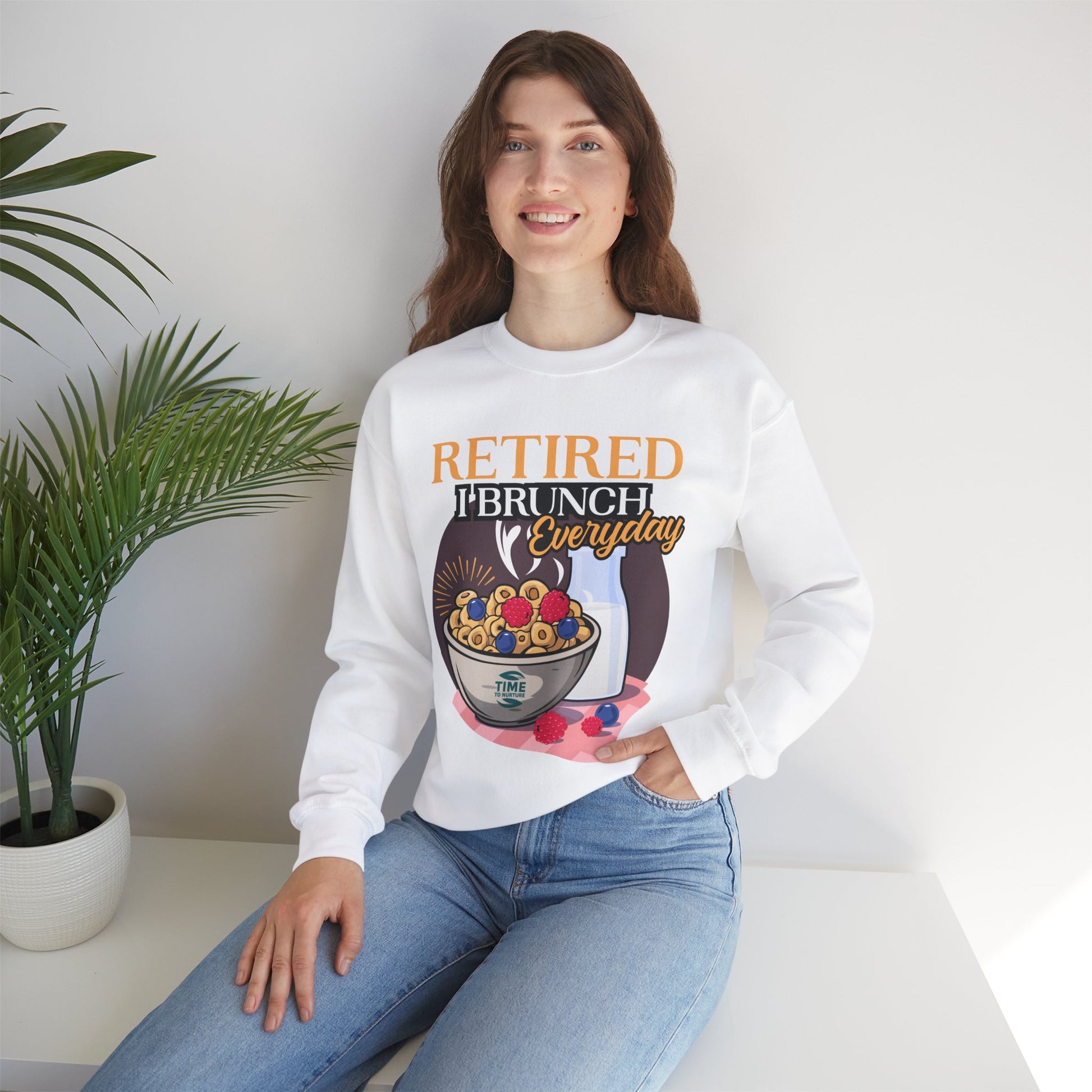 Unisex sweatshirt featuring the phrase "Retired I Brunch Everyday" in a fun, brunch-themed design. Ideal as a cozy retirement gift or a stylish top for celebrating the retired life with brunch vibes.