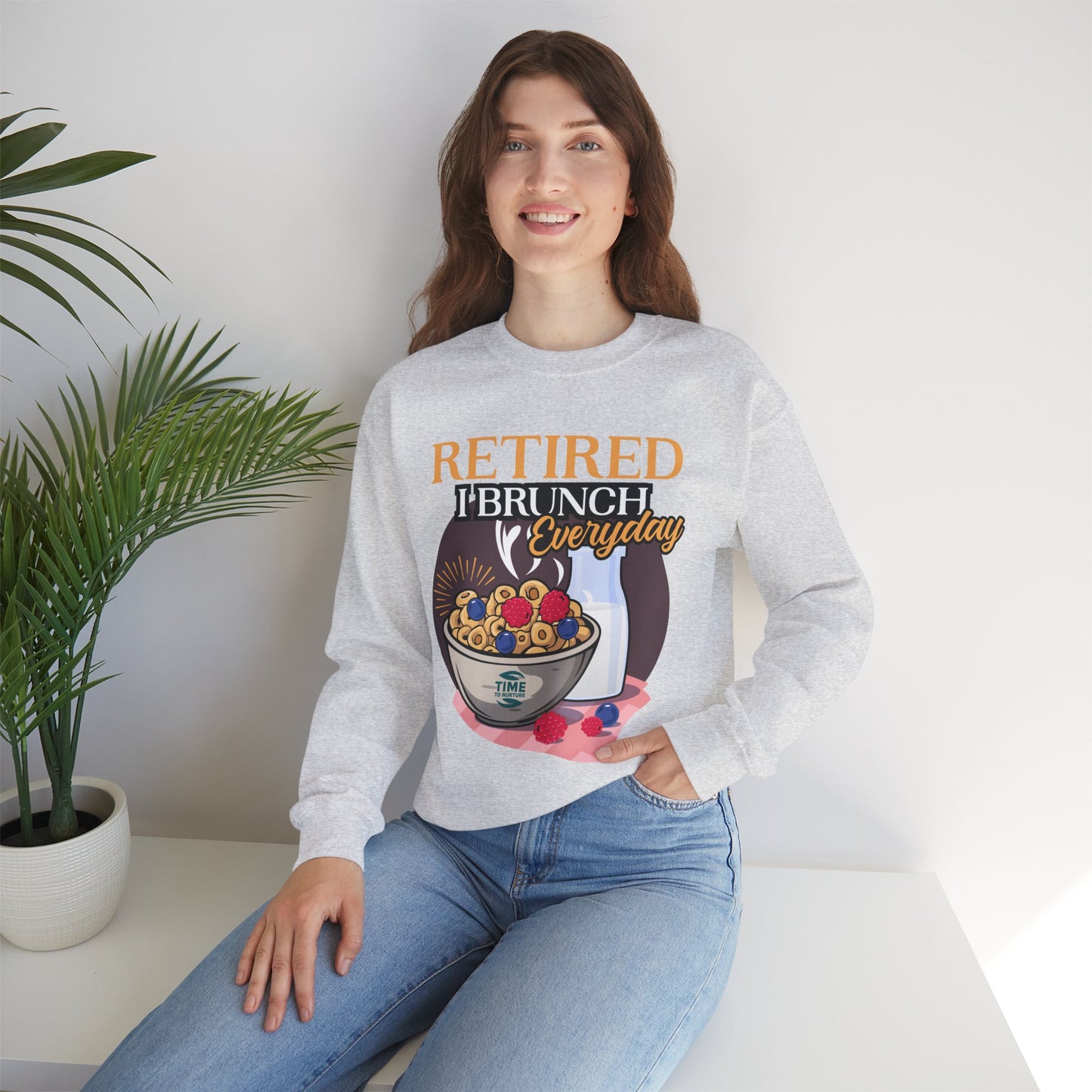 Unisex sweatshirt featuring the phrase "Retired I Brunch Everyday" in a fun, brunch-themed design. Ideal as a cozy retirement gift or a stylish top for celebrating the retired life with brunch vibes.
