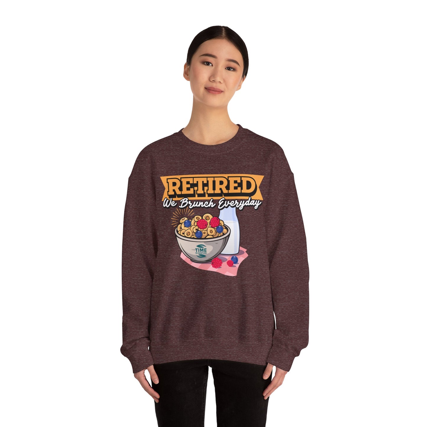 Unisex sweatshirt with the text Retired We Brunch Everyday, ideal as a cozy retirement gift for brunch enthusiasts. Features a classic crewneck design.