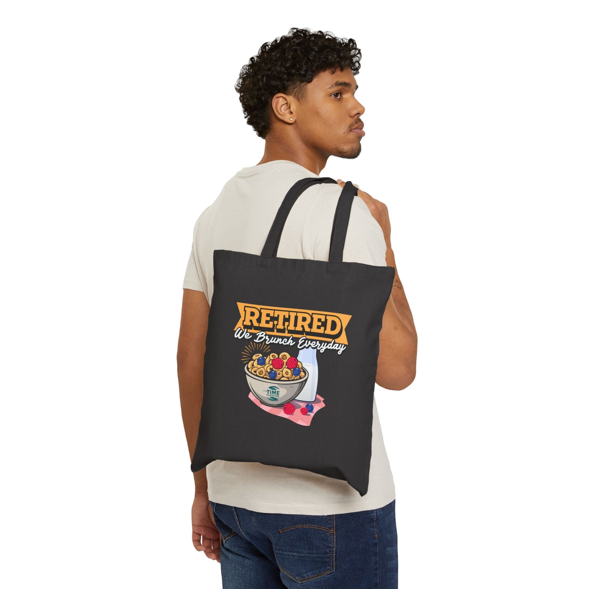 We Brunch Everyday cotton canvas tote bag featuring "Retired & Ready to Brunch" design, perfect for carrying essentials on retirement adventures and brunch outings.