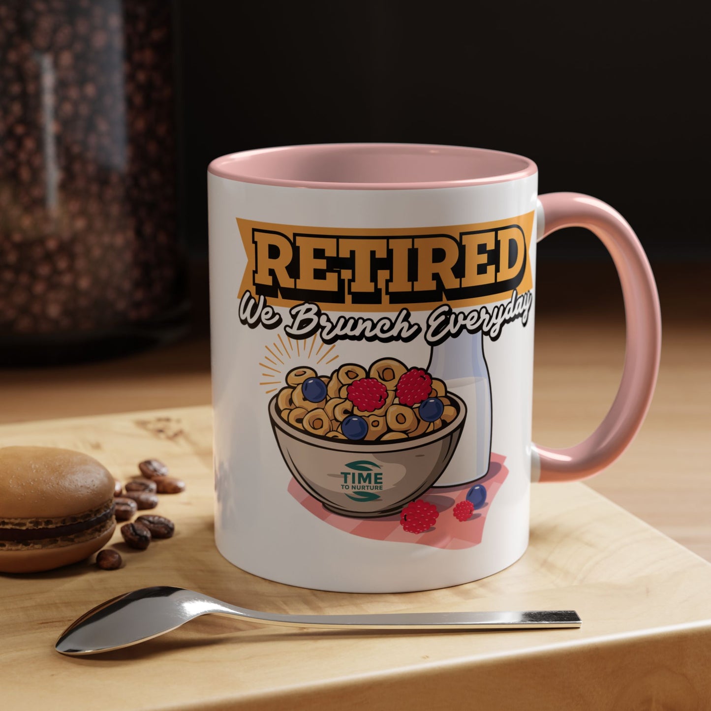 White coffee mug with retired we brunch everyday text in a playful font, ideal as a funny retirement gift, coworker present, or retirement party decor