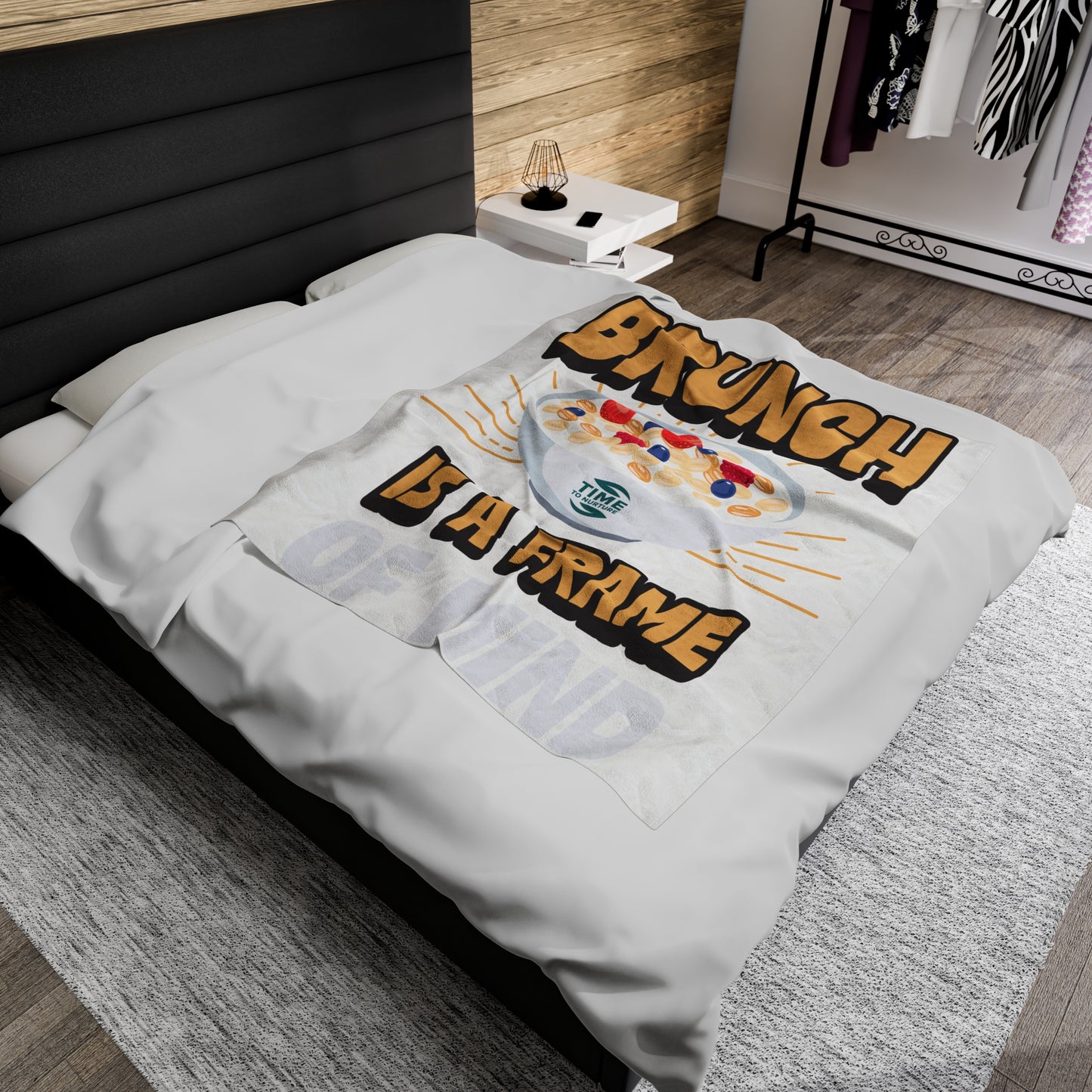 velveteen plush blanket with text "Brunch is a Frame of Mind" printed in elegant lettering, showcasing a cozy, soft texture ideal for lounging. Designed as home decor, it makes a thoughtful retirement gift, housewarming present, or stylish lounge throw.