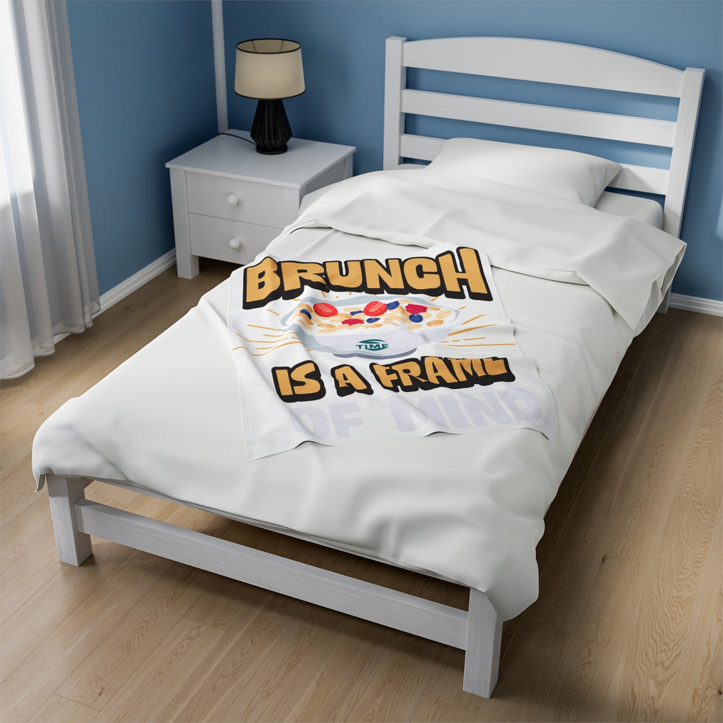 velveteen plush blanket with text "Brunch is a Frame of Mind" printed in elegant lettering, showcasing a cozy, soft texture ideal for lounging. Designed as home decor, it makes a thoughtful retirement gift, housewarming present, or stylish lounge throw.